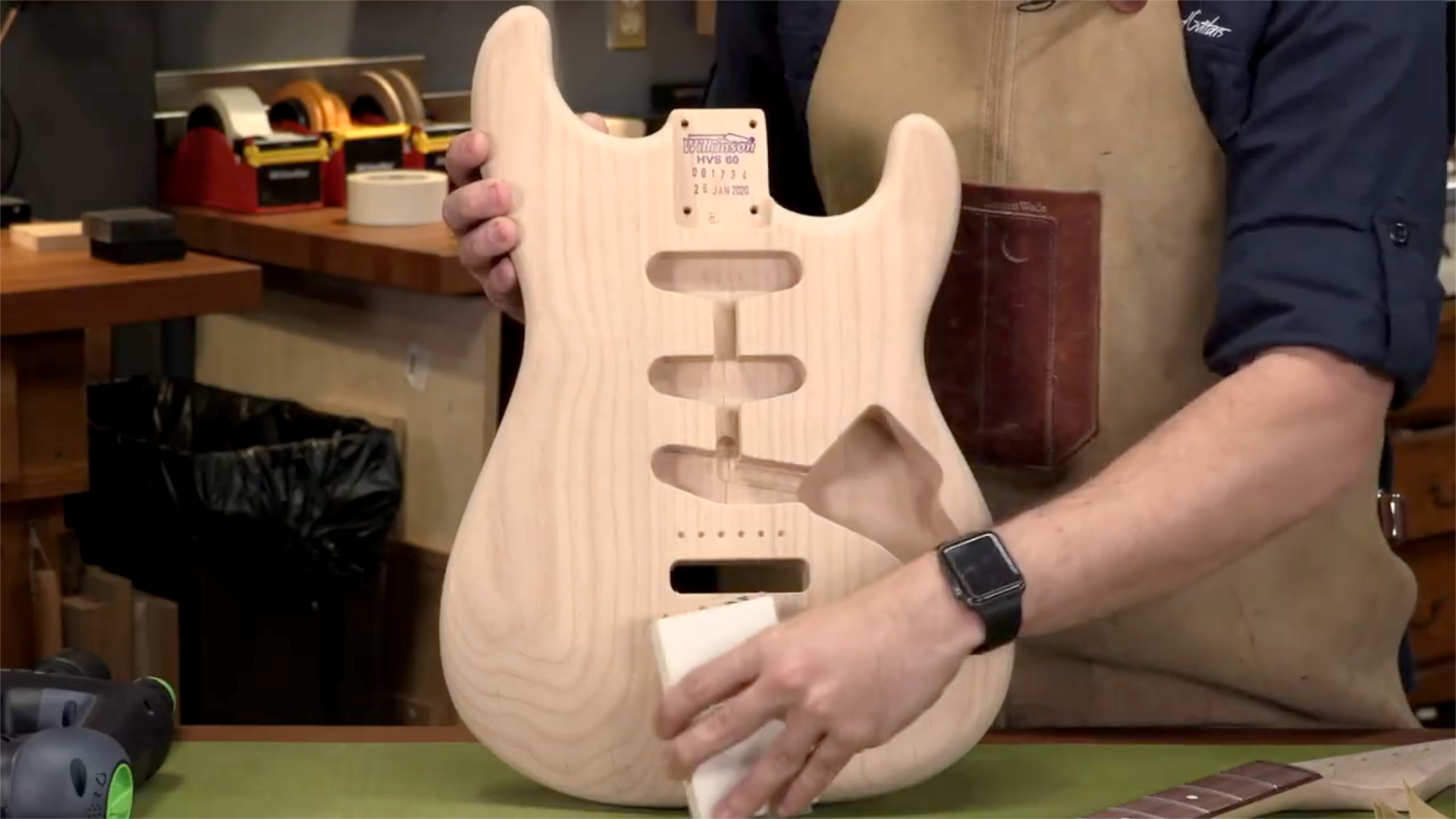 Sanding the guitar body