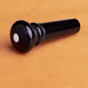 Pointe noire ondulée, avec point blanc