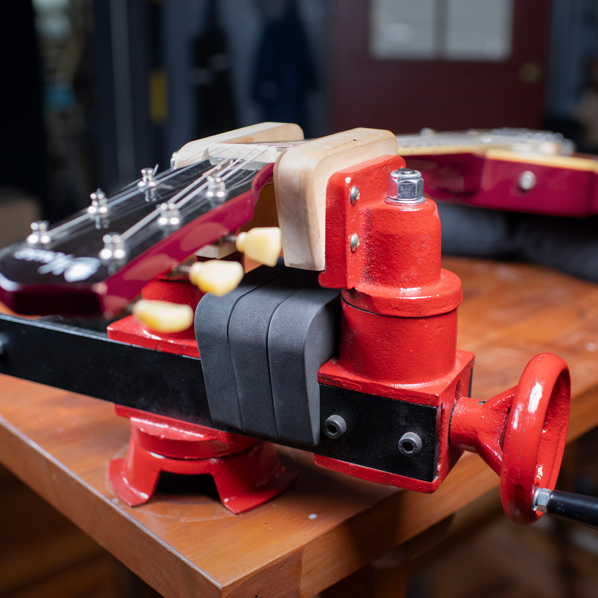 Protection de manche pour étau de réparation de guitare