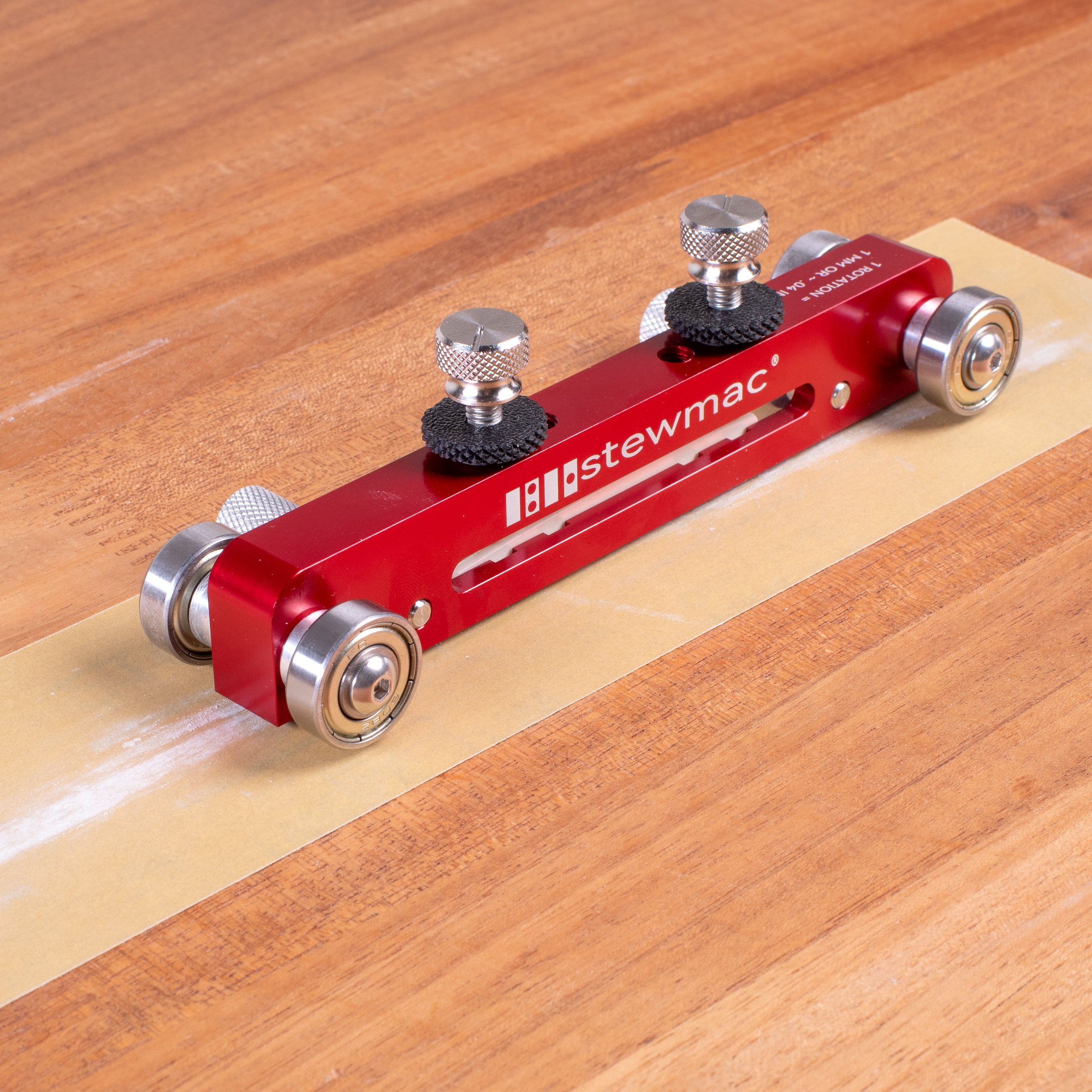 Écrou StewMac + ponceuse Saddle