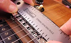 Photo : règle espacement des cordes 