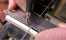 Mesure de l’écrou de pont et de la sillet