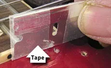 Mettre du ruban adhésif sur un rasoir