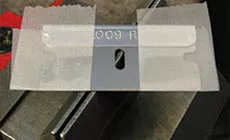 Lame de rasoir collée