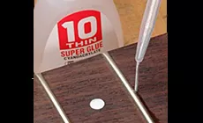 Collage d’une frette