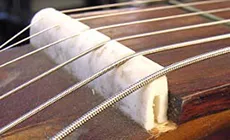 Casse sillet de tête pour cordes