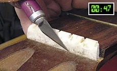 Scriblage avec une lame X-Acto