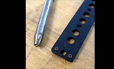 Eyelets in Jazz Bass pickup flatwork