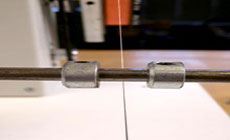 Traverse limiter and pickup wire