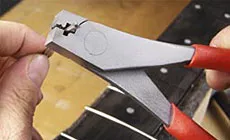 Pince à sertir à frettes