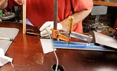 Photo : serrage de la barre de basses