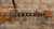 Capo fastened to the strings on the fretboard