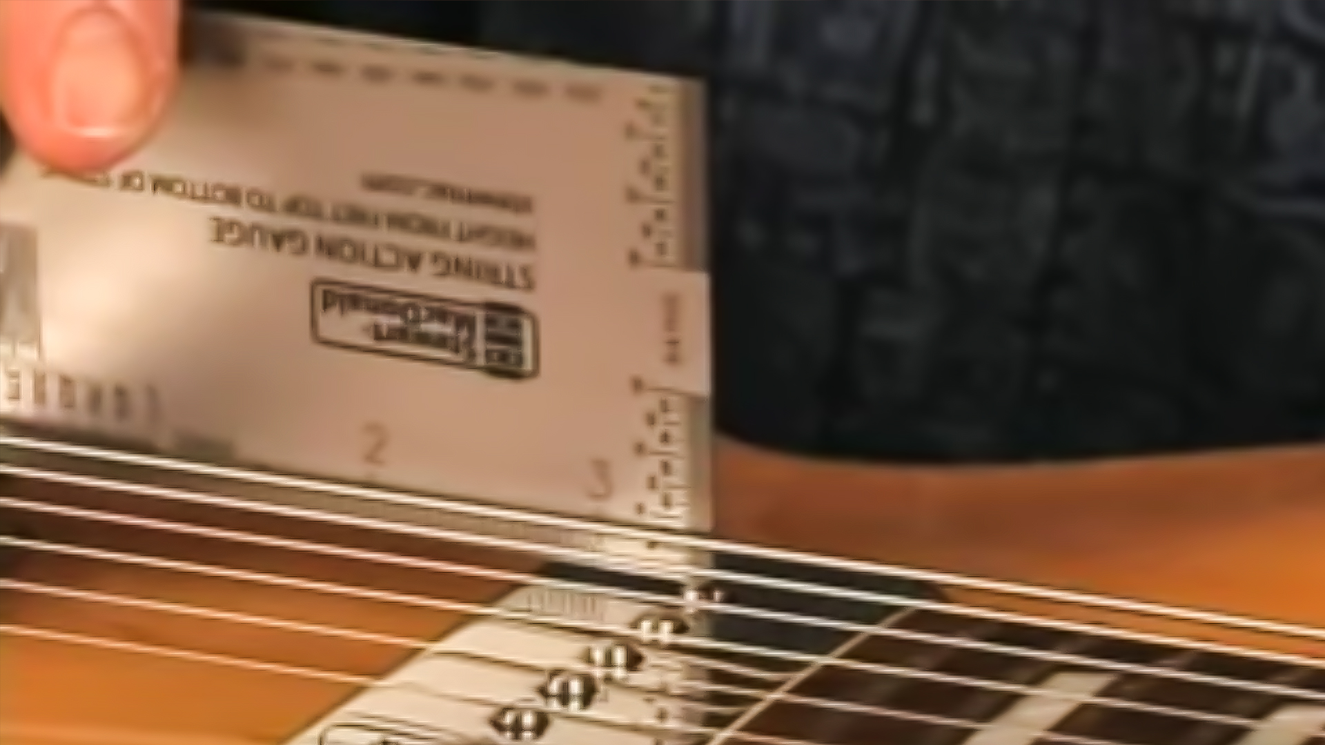 Jauge de hauteur des cordes